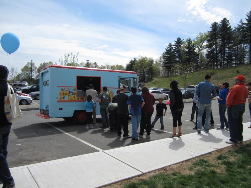 Multiple ice cream trucks catering a large Connecticut corporate event